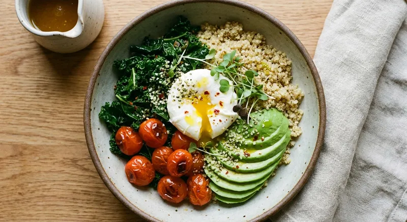 Savory Quinoa Breakfast Bowl with Sautéed Kale, Tomatoes & Avocado