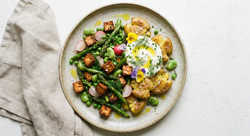 Smoky Tofu & Spring Vegetable Hash with Crispy Baby Potatoes and Lemon-Garlic Yogurt