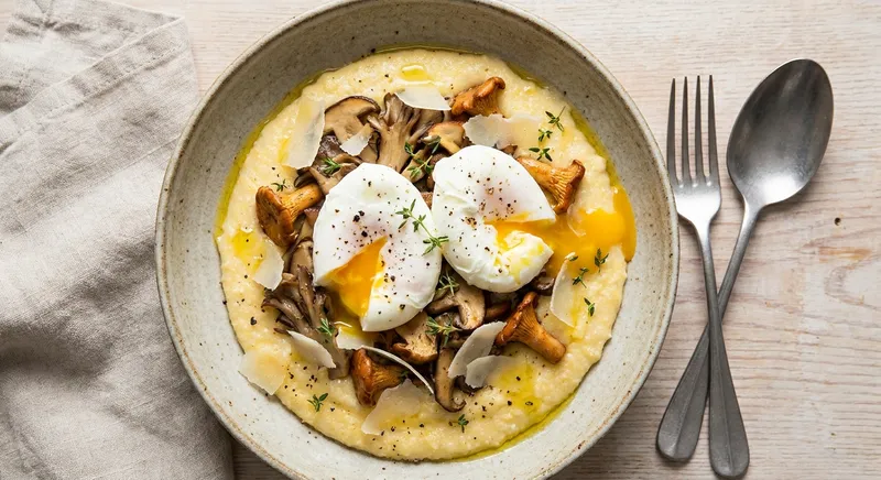 Soft-Poached Eggs on Creamy Parmesan Polenta with Sautéed Autumn Mushrooms & Thyme