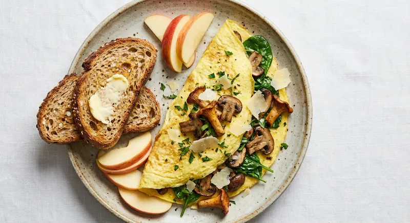Spinach & Mushroom Omelette with Whole-Grain Toast and Apple